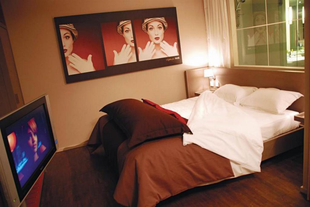 Standing Hotel Suites By Actisource Roissy-en-France Quarto foto